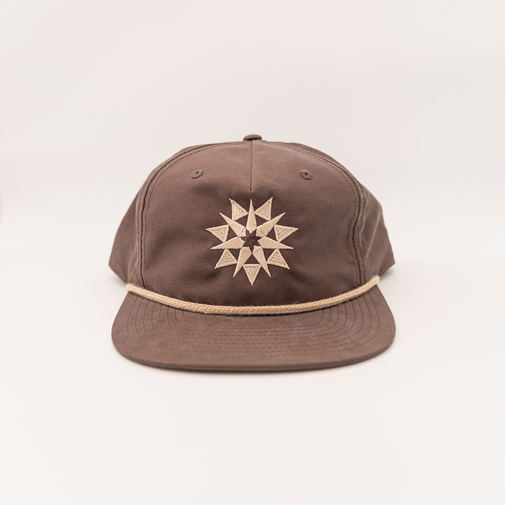 Star Rope Hat with Higher Grounds Trading Co star logo on front and rope brim feature in desert mocha