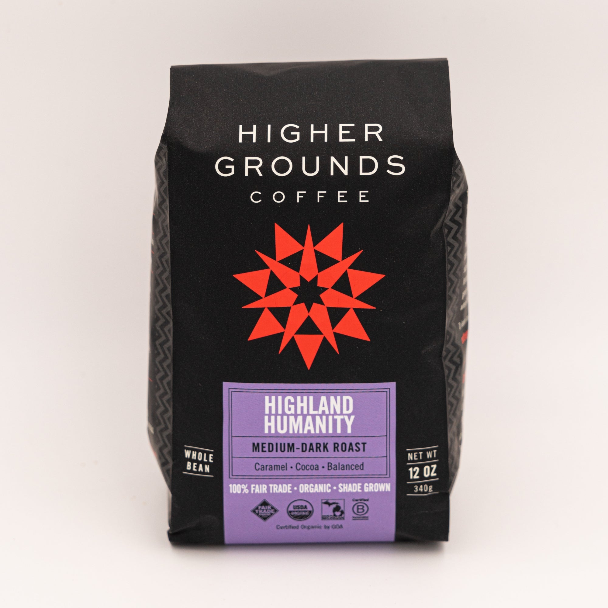bag of organic medium dark roast Highland Humanity coffee beans from Higher Grounds Trading Co